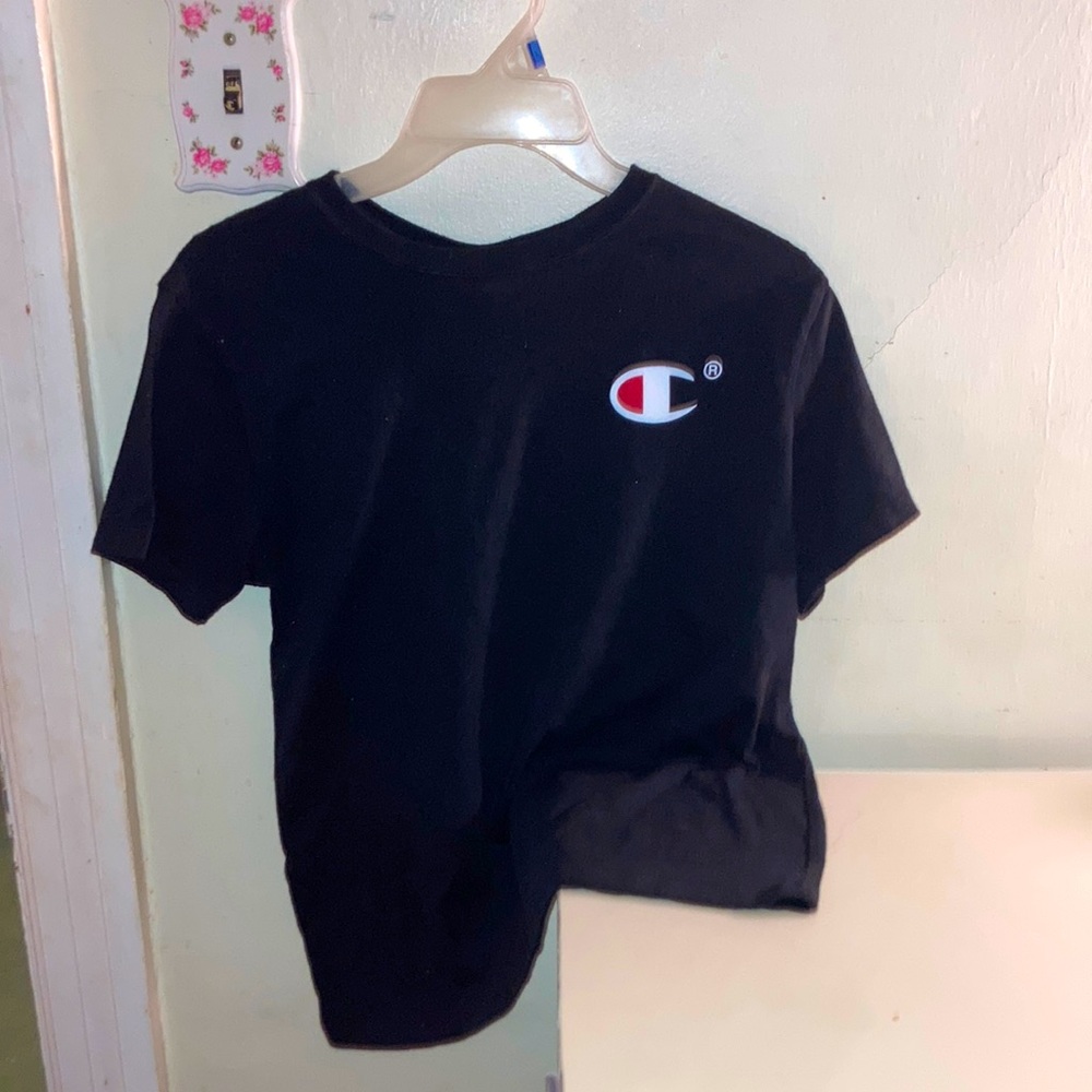 The brand Champs T-Shirt. A fashion brand. Size (Med.)